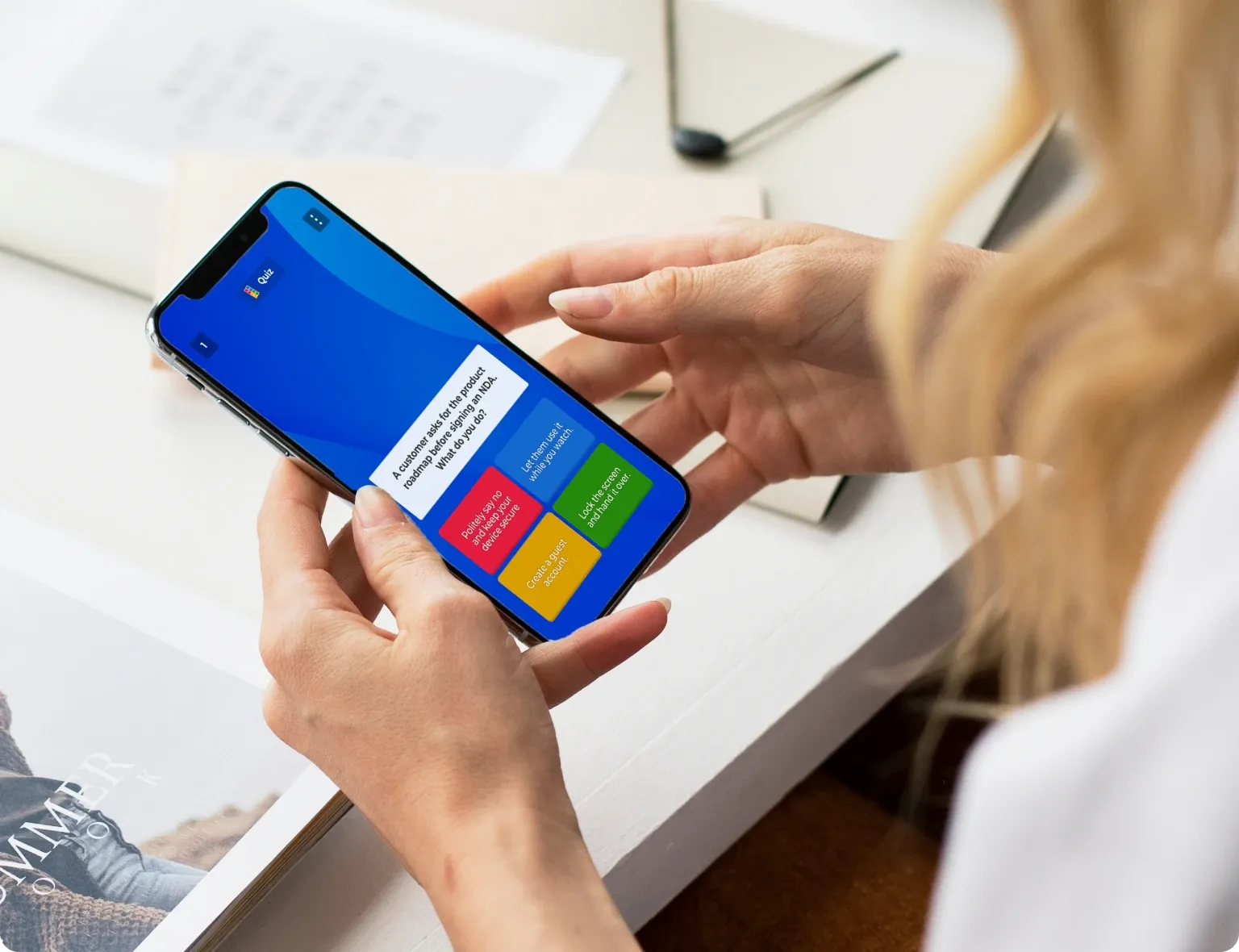 Person answering a Kahoot quiz question about handling a customer NDA request on a smartphone