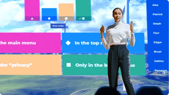 Female presenter using Kahoot! to present at a large event
