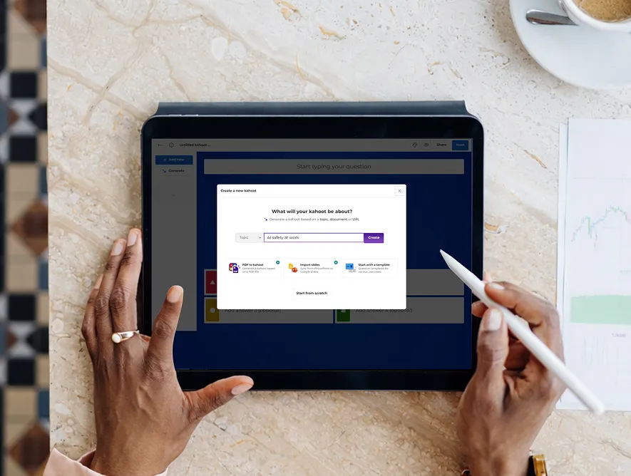 Person using a stylus to create a new Kahoot quiz on a tablet, with the quiz topic setup dialog open on screen